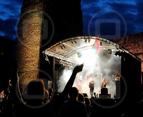 6m arc roof stage at Oxford Castle summer music festival.